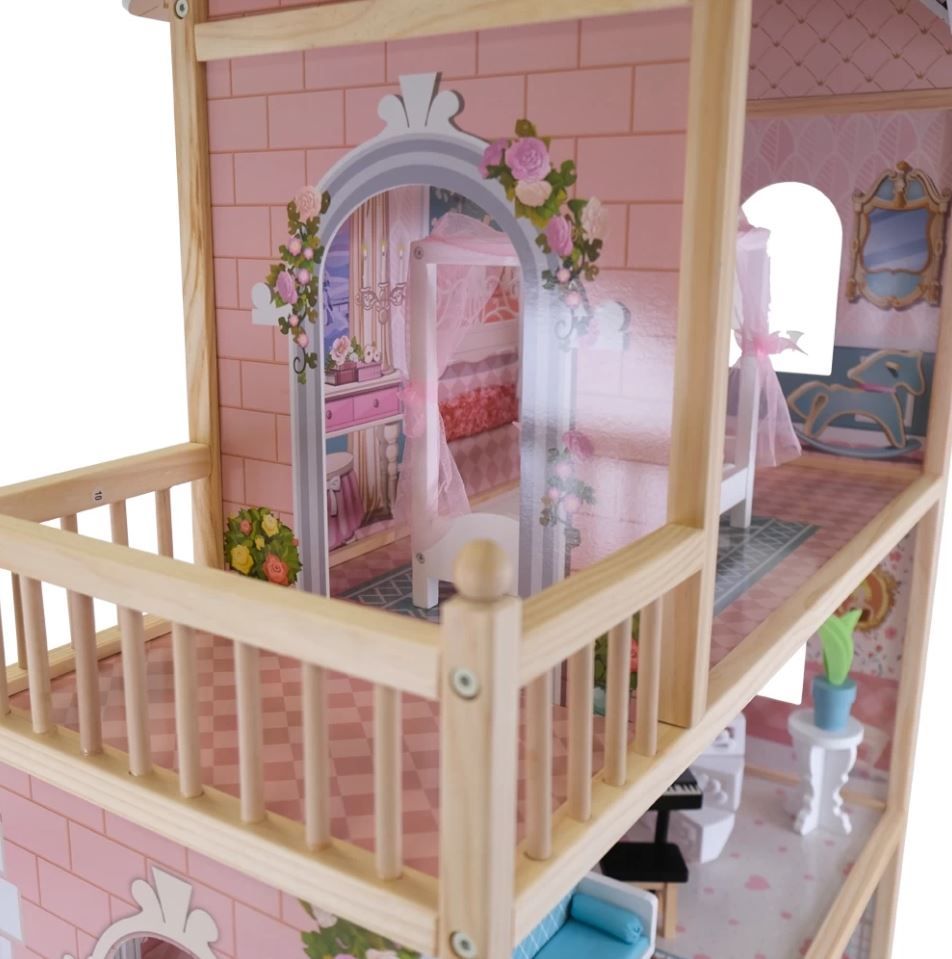 wooden dollhouse with warm led lights glowing in a cozy evening playroom setting