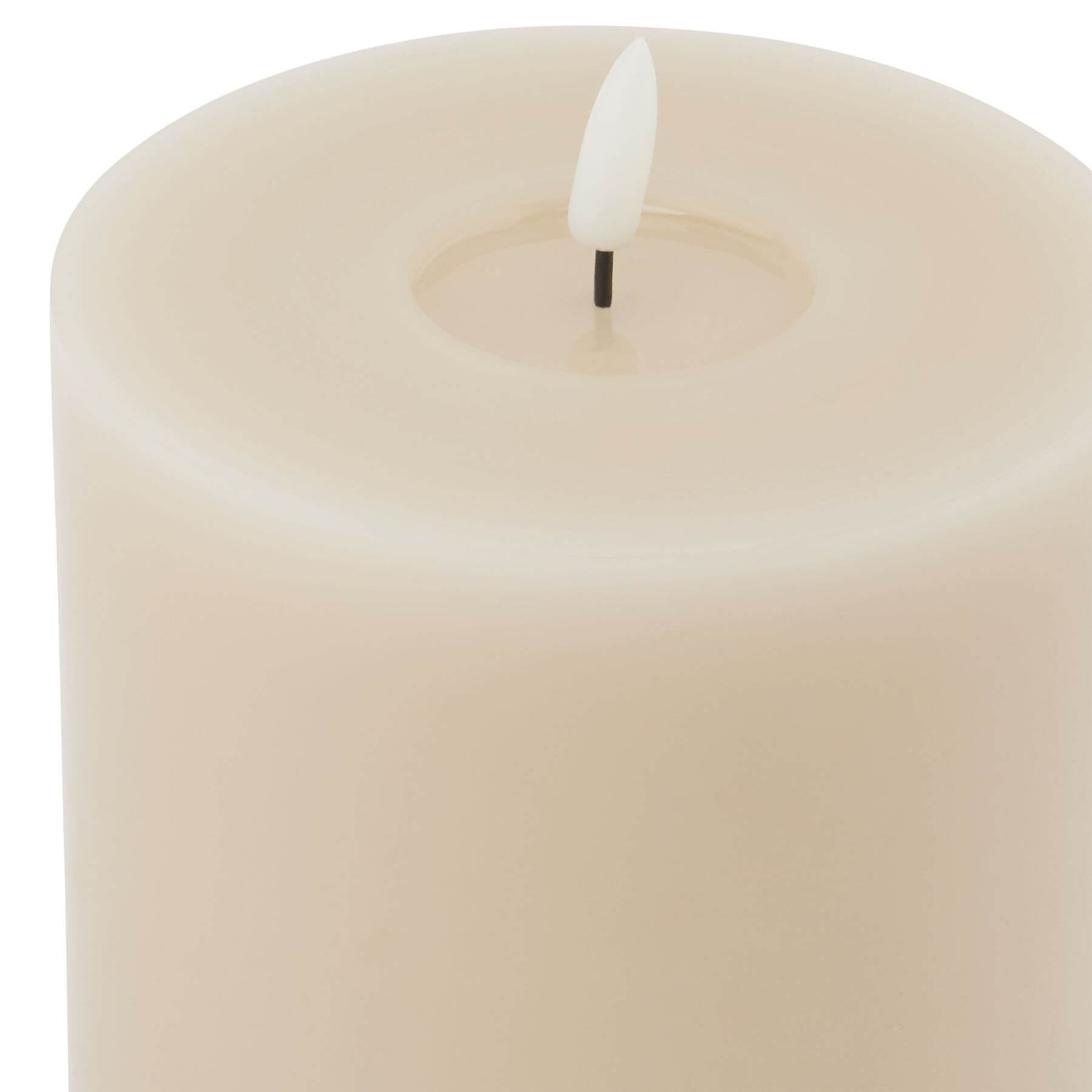 Taupe LED wax candle with realistic melt effect and flickering glow for home decor ambiance by RoomLondon at brixbailey.com