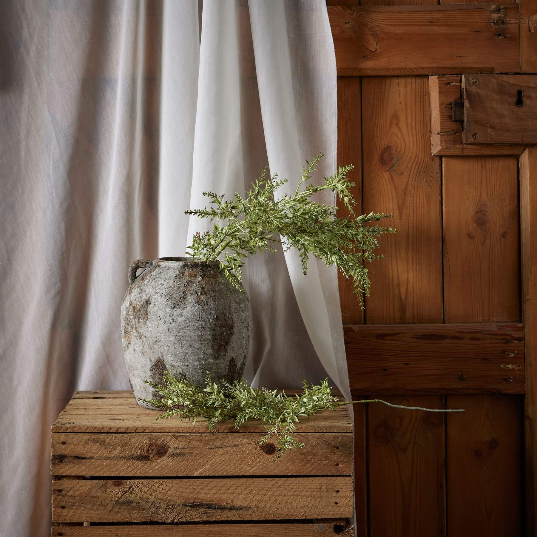 Handcrafted plastic broom stem with feathery green strands for rustic floral arrangements by sostter at brixbailey.com
