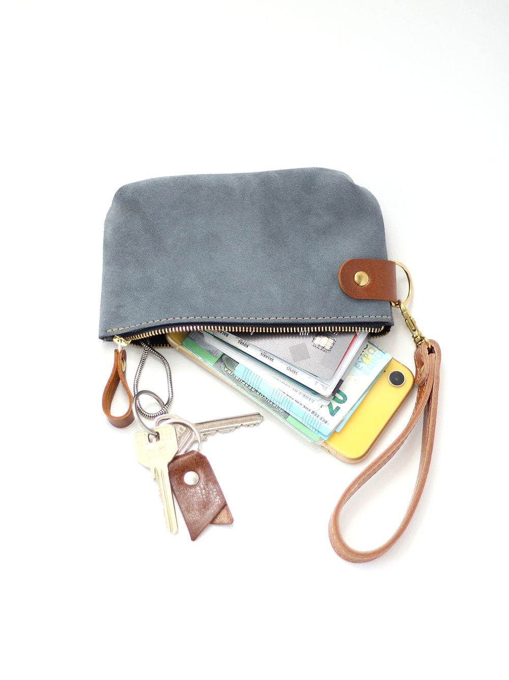 Versatile Handmade Leather Pouch – Multi-Purpose with Strap by TOKS VISOKS at www.brixbailey.com