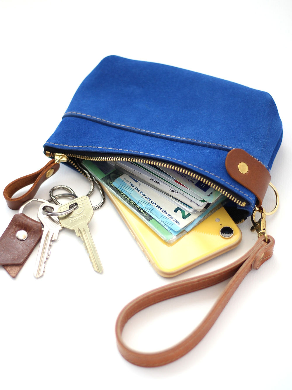 Versatile Handmade Leather Pouch – Multi-Purpose with Wrist Strap by TOKS VISOKS at www.brixbailey.com