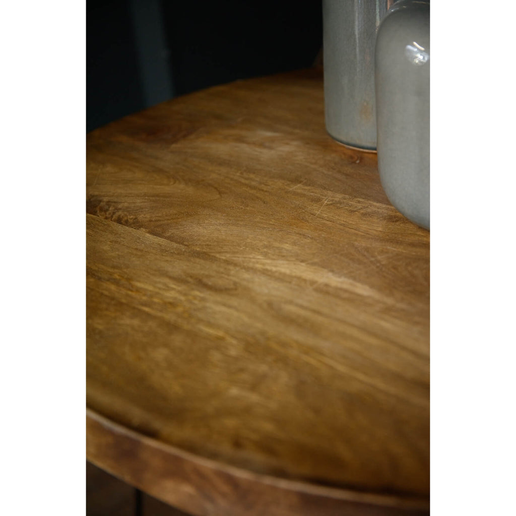 Industrial bar table with solid hardwood top and matte black metal base, warm brown tones, counter height. by sostter at brixbailey.com