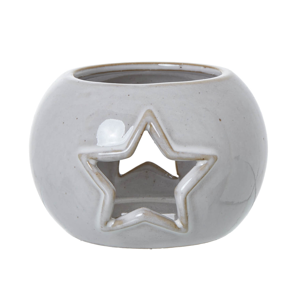 White ceramic tealight holder with star cutouts, projects constellations when lit, minimalist home decor  

**  
- **Keywords included:** ceramic tealight holder, star cutouts, constellations, minimalist home decor  
- **Clear description:** Visually conveys the productâ€™s design and function  
- **SEO & accessibility optimized:** Concise, descriptive, and keyword-rich for both search engines and screen readers by sostter at brixbailey.com