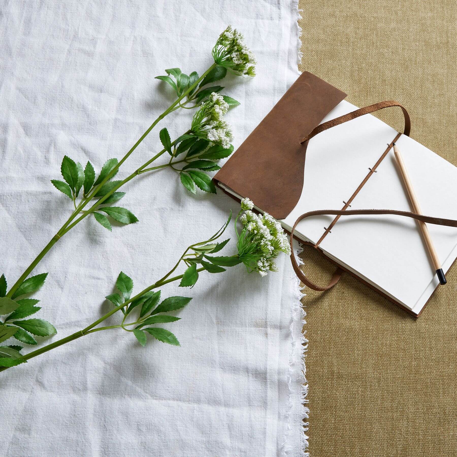 Lifelike artificial cow parsley stems with creamy white blooms and green stems, 100cm tall for home decor   

- **Keywords included:** artificial cow parsley, creamy white blooms, green stems, home decor  
- **Clear description:** Visually describes the product's appearance and purpose  
- **SEO & accessibility optimized:** Concise, keyword-rich, and helpful for screen readers by sostter at brixbailey.com