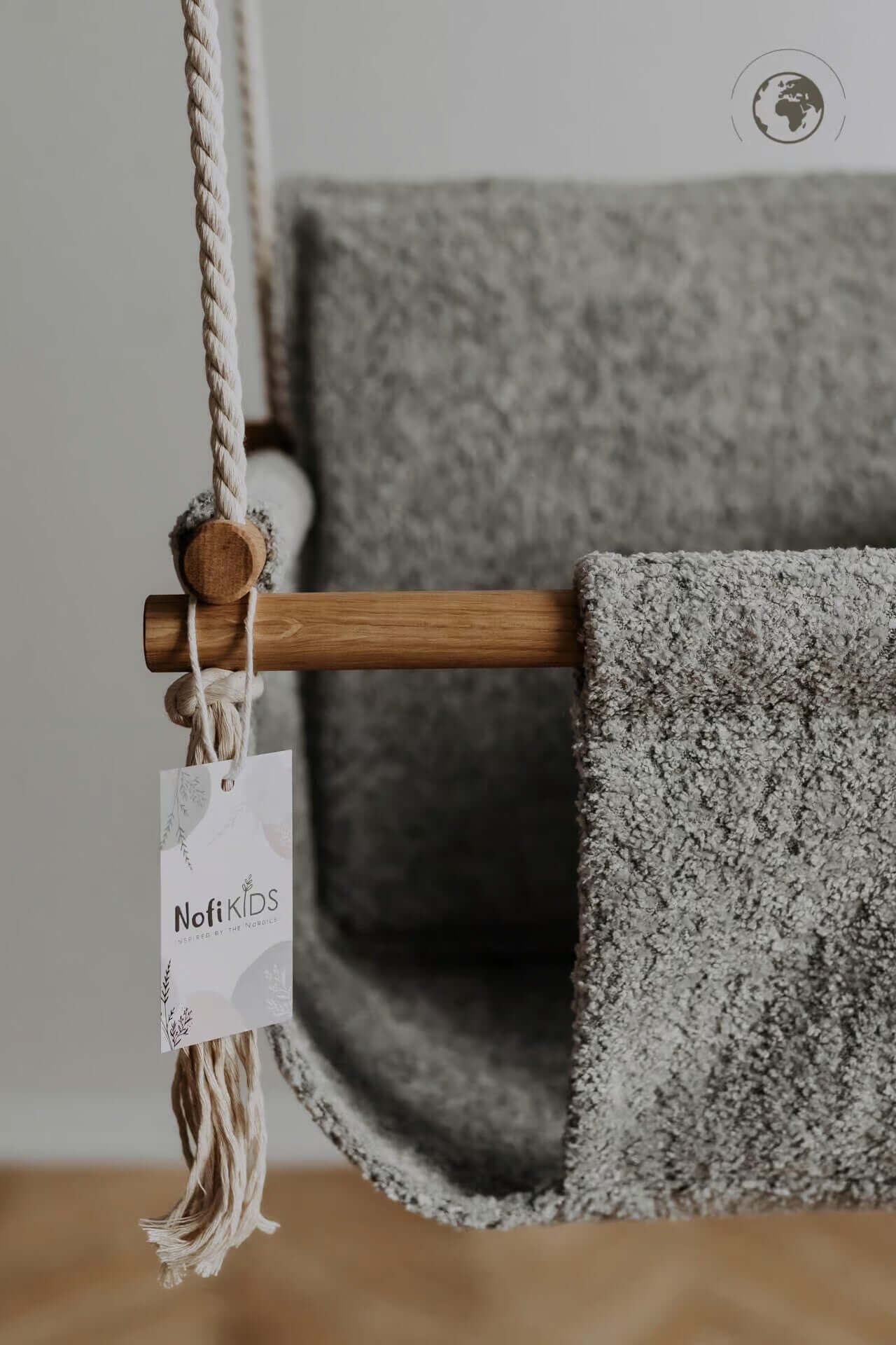 Discover Comfort and Sustainability with the Bouclé Cloth Baby Swing - Eco-Friendly & Safe by Nofi KIDS at www.brixbailey.com