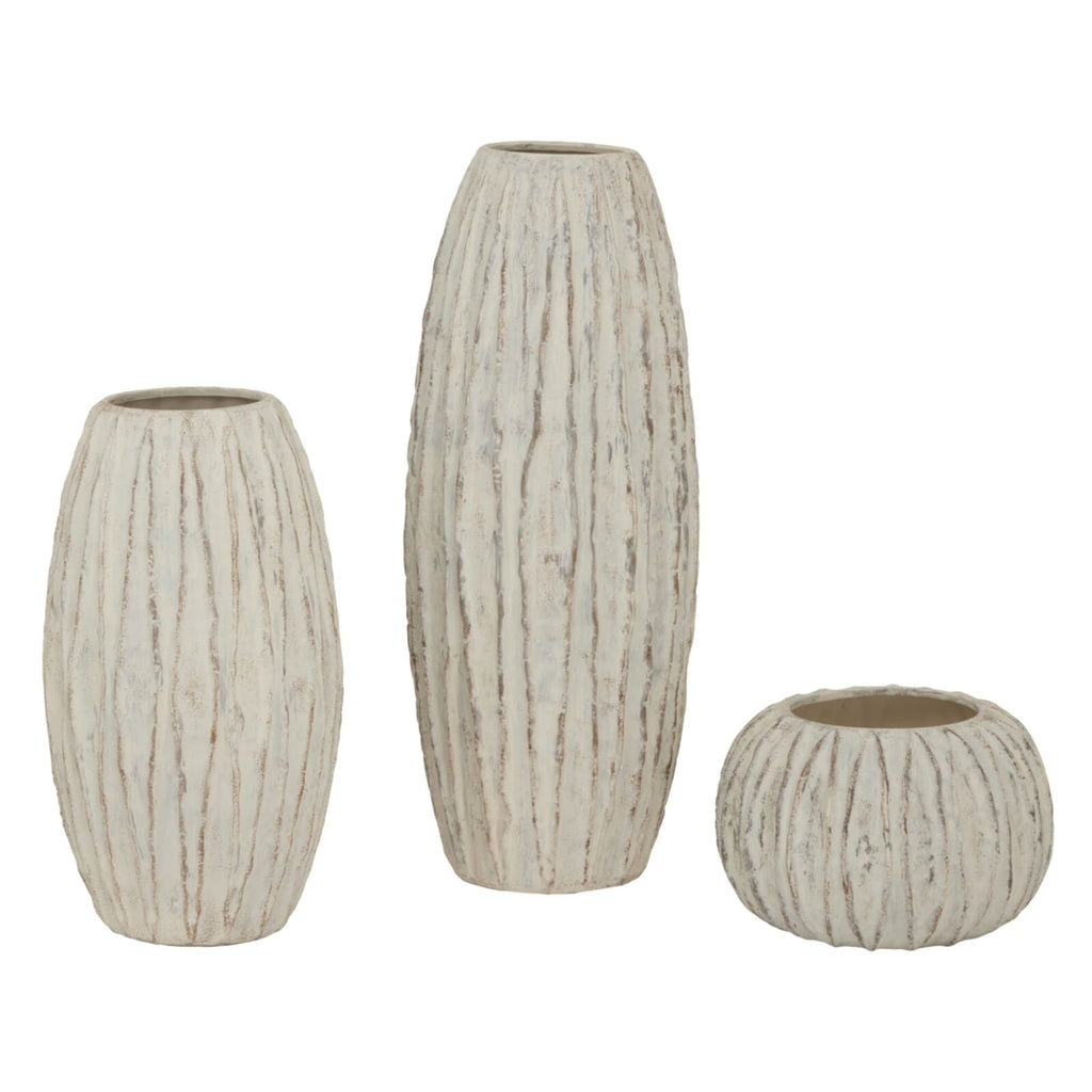 White ceramic sculptural vase with vertical fin detailing, contemporary Lorenzo Collection decor piece for modern interiors. by sostter at brixbailey.com