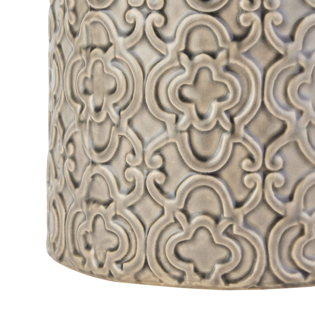 Handcrafted grey ceramic sculptural vase with intricate raised patterns, removable lid, and contemporary organic design. by Sostter at brixbailey.com