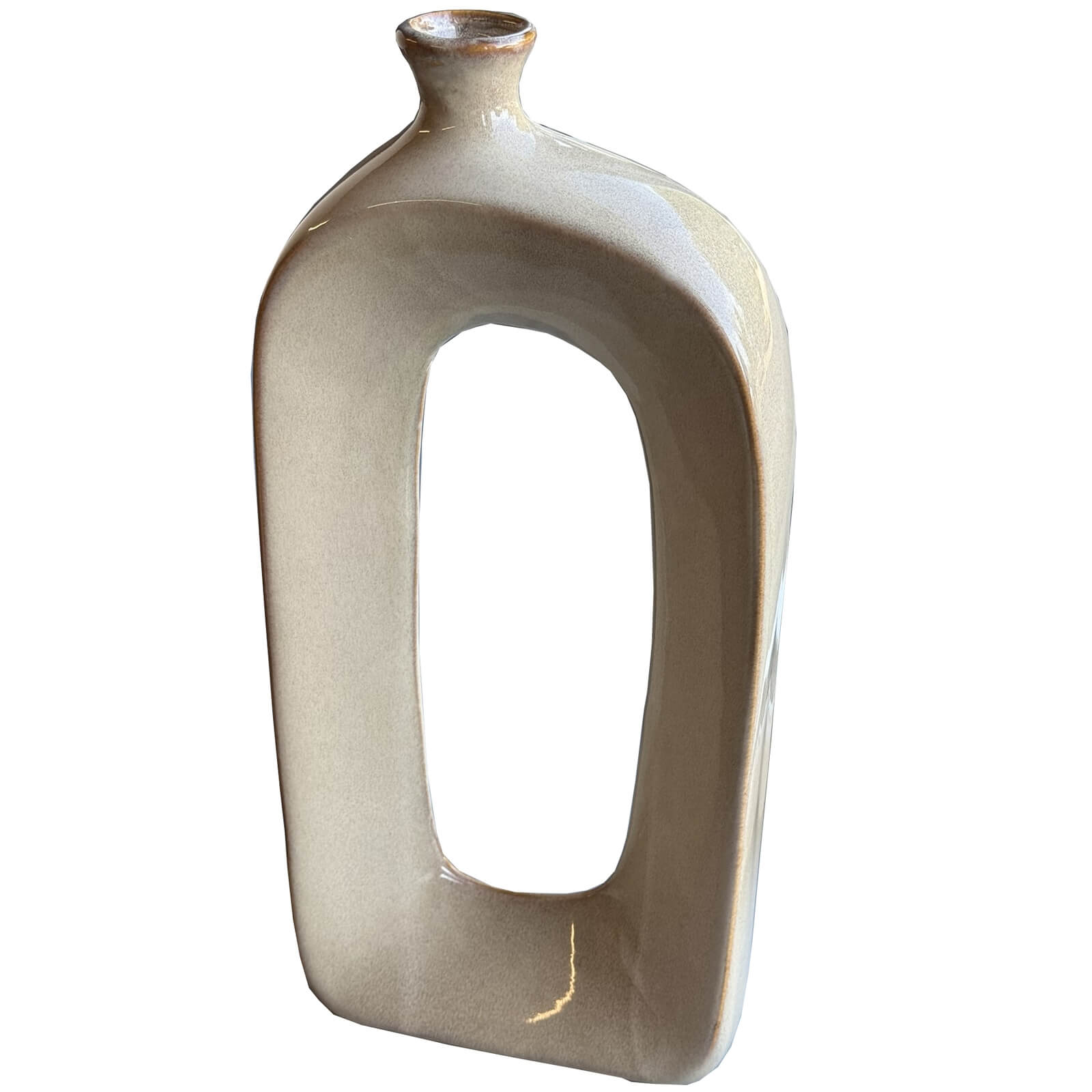Minimalist hollow brown ceramic vase with organic texture, creating dynamic light and shadow patterns, 43cm tall, Sabbia collection. by RoomLondon at brixbailey.com