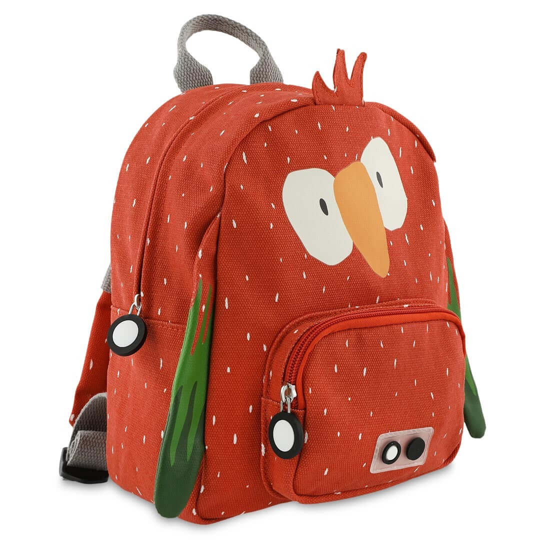 mr parrot kids backpack open on a sunny playground, showing its spacious compartments