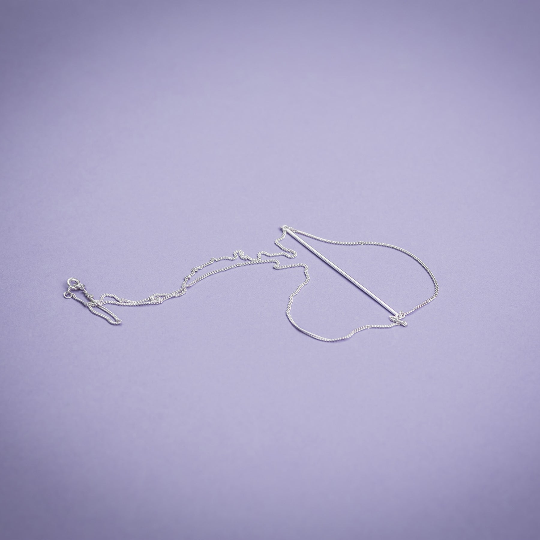 Minimalist Silver SWING Necklace – Handcrafted & Elegant by Maarja Palu at www.brixbailey.com