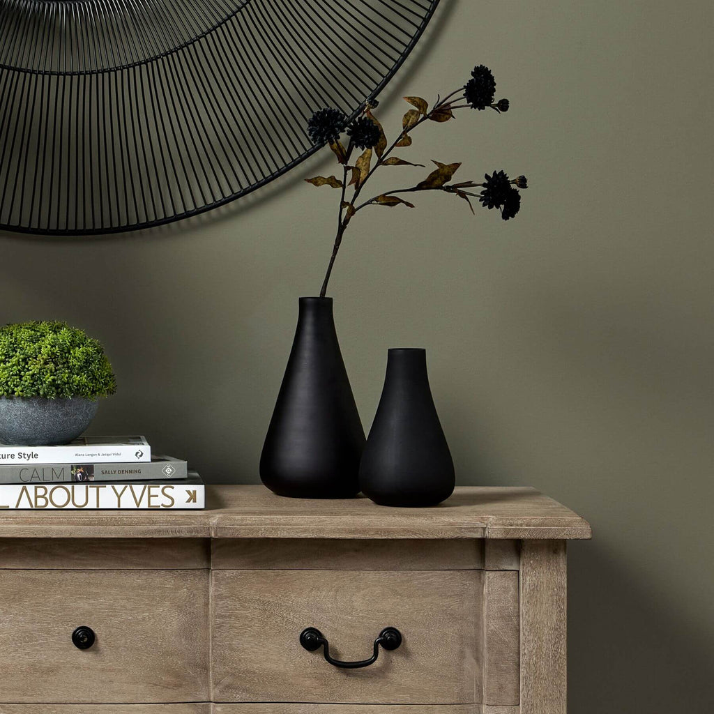 Handcrafted black tapered glass vase with matte finish, modern minimalist design for floral arrangements. by Sostter at brixbailey.com