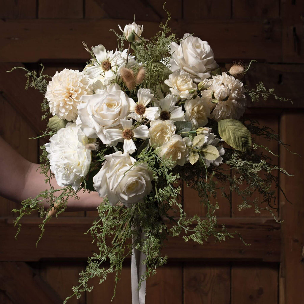 White artificial dahlia stem with lifelike layered petals, 62cm tall, perfect for home decor arrangements. by sostter at brixbailey.com