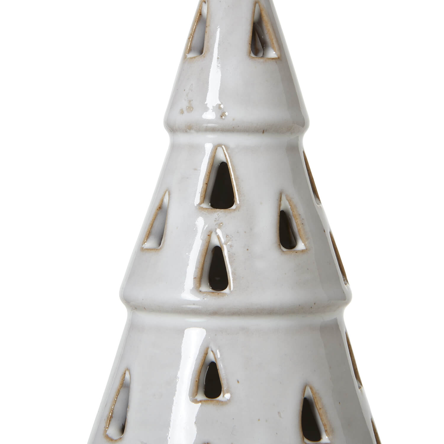 Handcrafted white ceramic LED tree with intricate cut-out patterns, casting warm ambient light for minimalist decor. by sostter at brixbailey.com