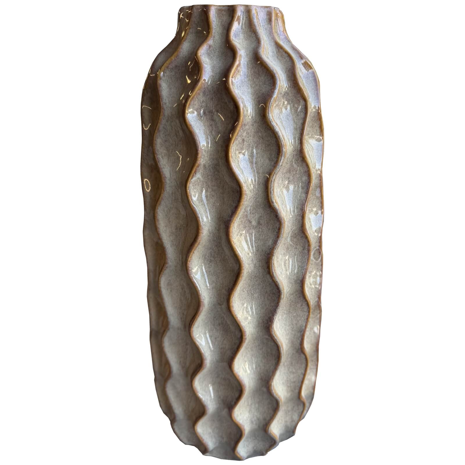 Handcrafted brown ceramic wave vase, sculptural desert-inspired design, 47cm tall, earthy neutral home decor centerpiece  

**  
- **Keywords:** ceramic wave vase, desert-inspired, brown, handcrafted, home decor  
- **Clear description:** Visually conveys the vase's shape, material, color, and design inspiration  
- **SEO & accessibility:** Natural keyword integration while describing the image for screen readers by Sostter at brixbailey.com
