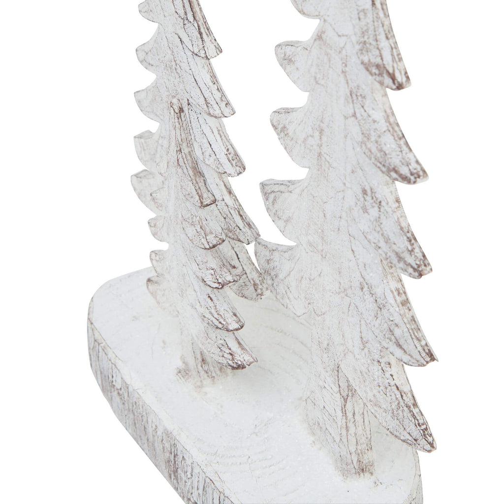 Handcrafted white resin winter pine tree sculpture with snow-dusted branches, set of three for holiday decor by RoomLondon at brixbailey.com