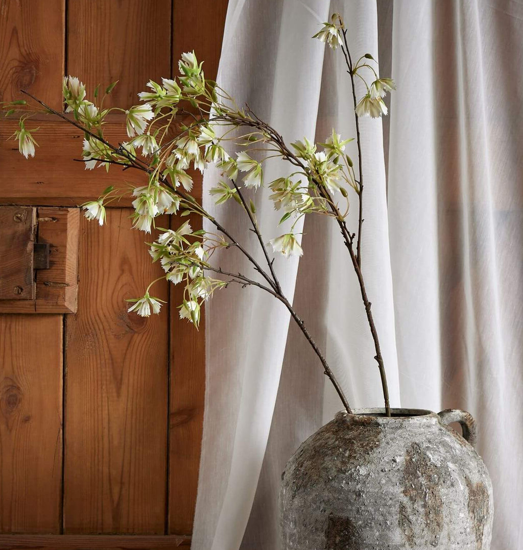 Lifelike artificial Elaeocarpus stem with finely textured green leaves, 100cm tall, for zero-maintenance botanical decor. by sostter at brixbailey.com