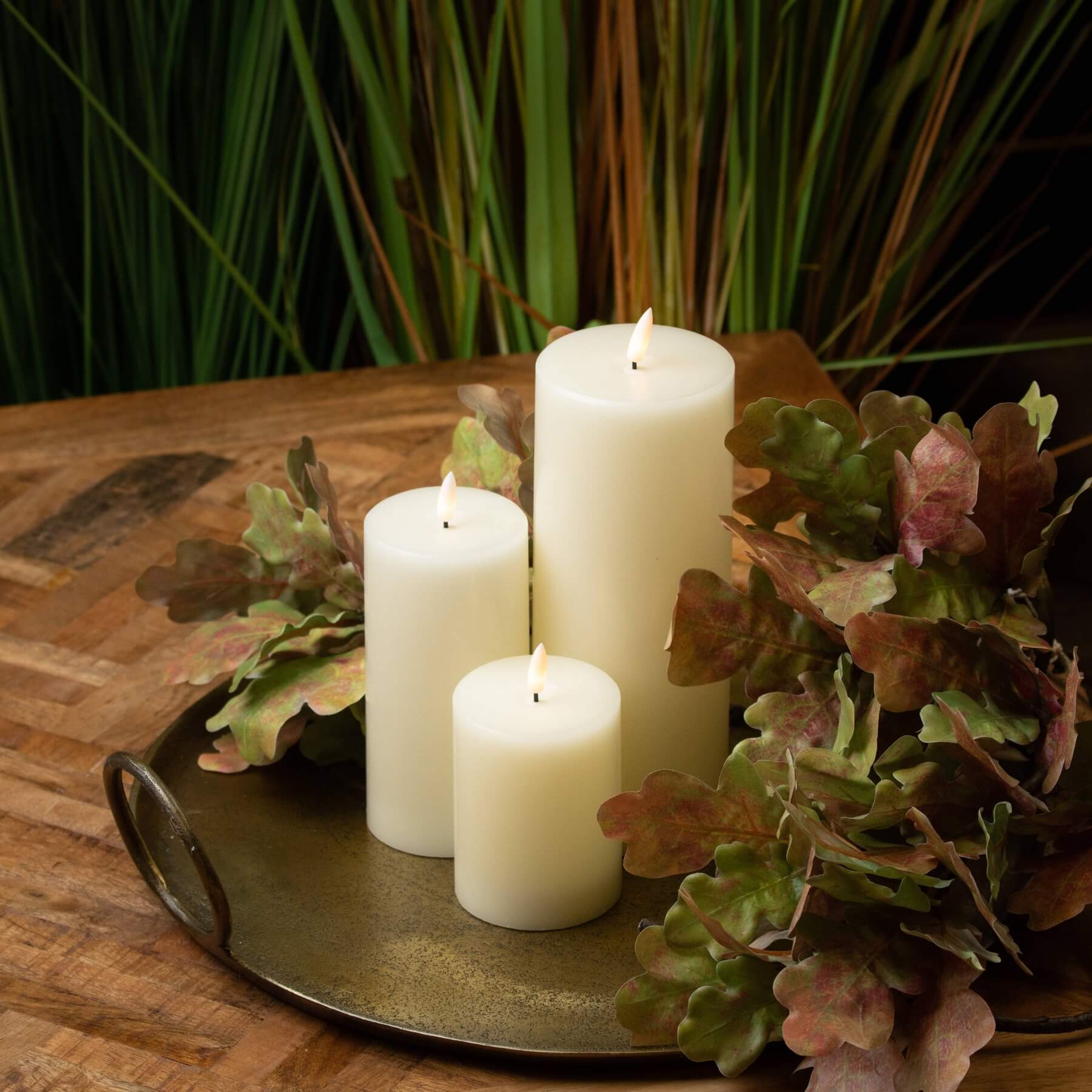 Cream LED flameless candle with realistic amber flicker, ivory finish, safe for homes with kids and pets. by Sostter at brixbailey.com