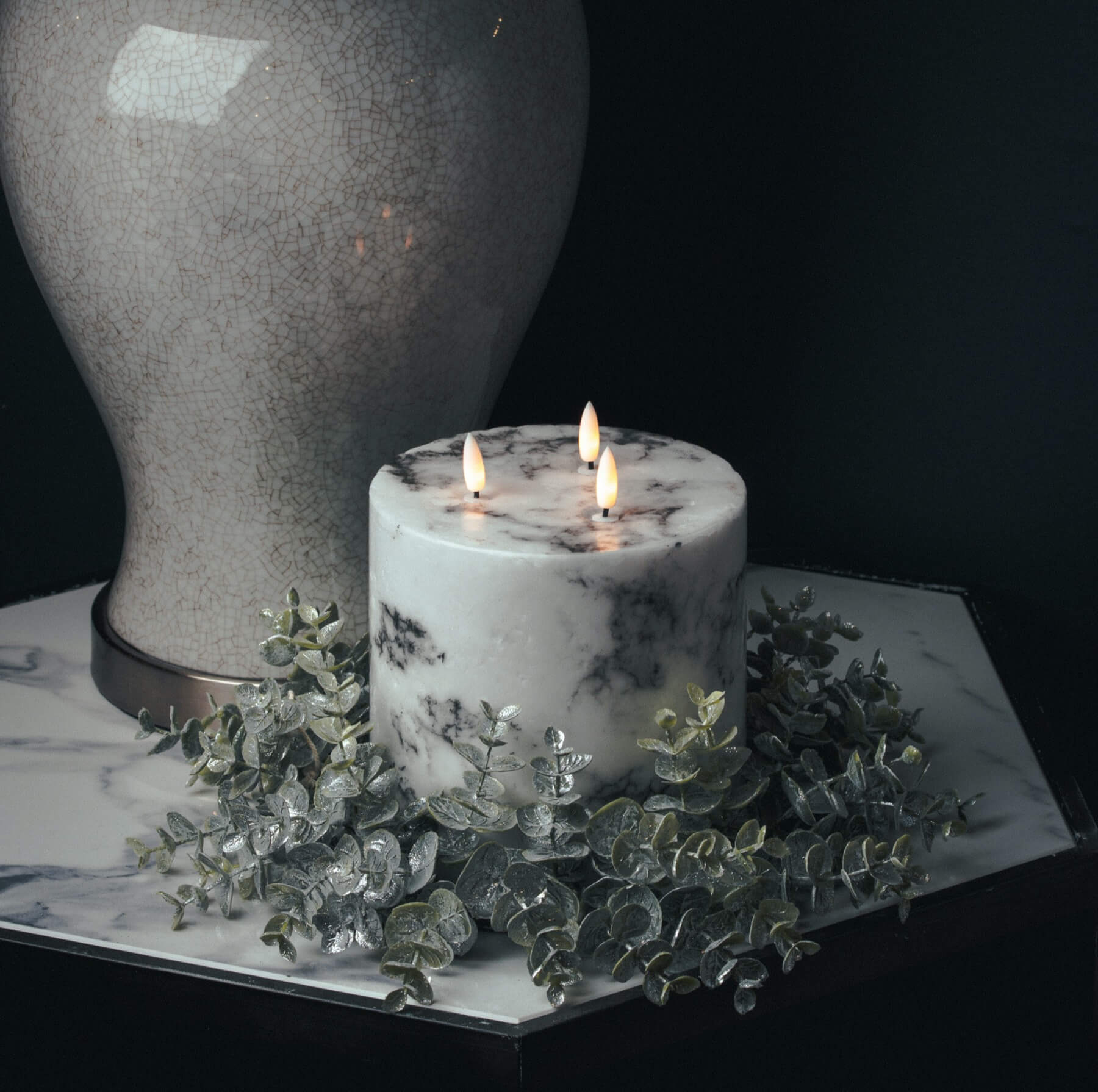 Marble-effect three-wick LED candle with realistic amber flickering flames, neutral white decor accent by Sostter at brixbailey.com