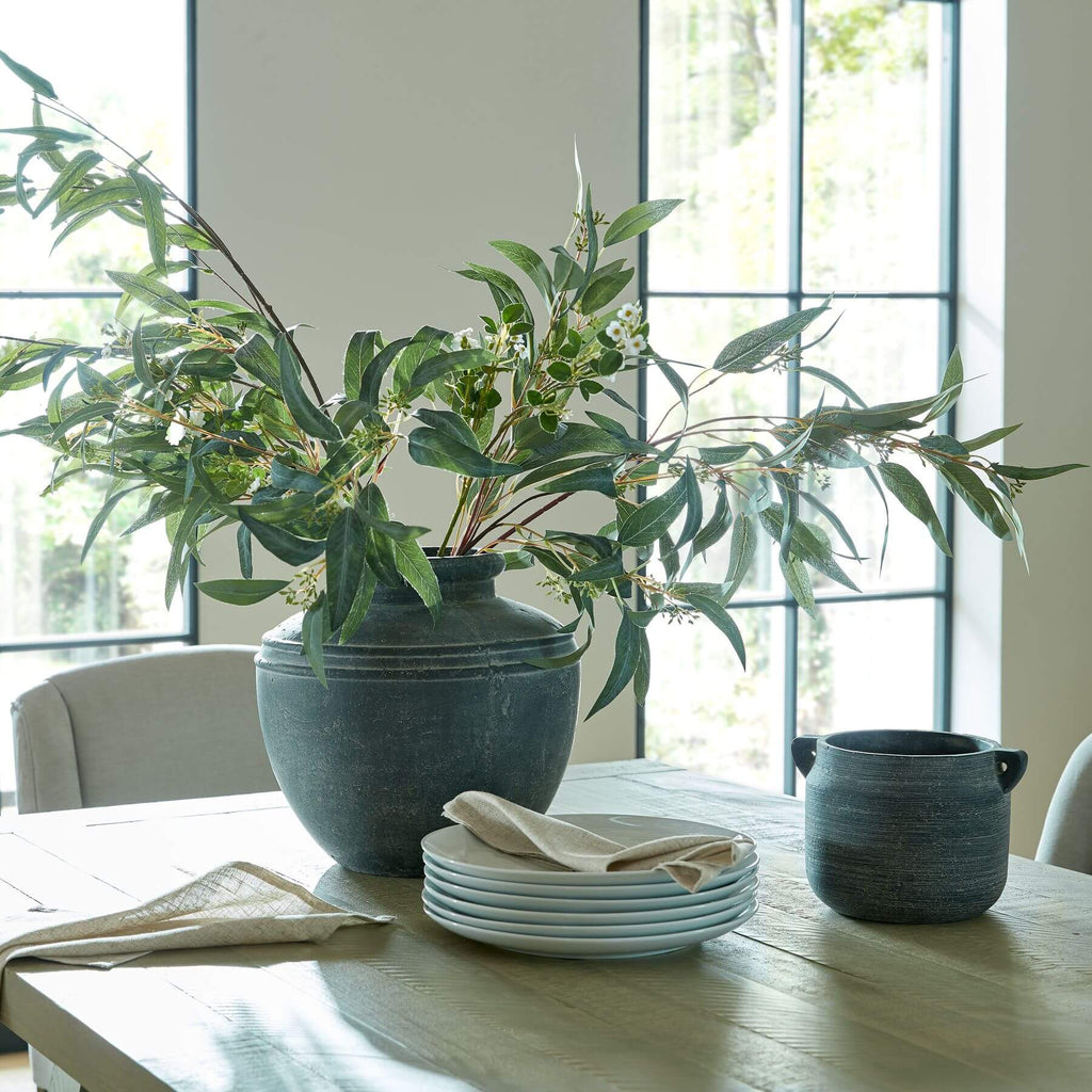 Lifelike seeded eucalyptus spray with green leaves and pods for farmhouse or boho decor  

*(98 characters)* by Sostter at brixbailey.com
