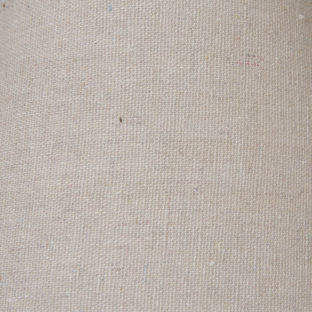 Rustic table lamp with weathered gray-washed wood base and natural linen shade, perfect for farmhouse or industrial decor.by Sostter at brixbailey.com