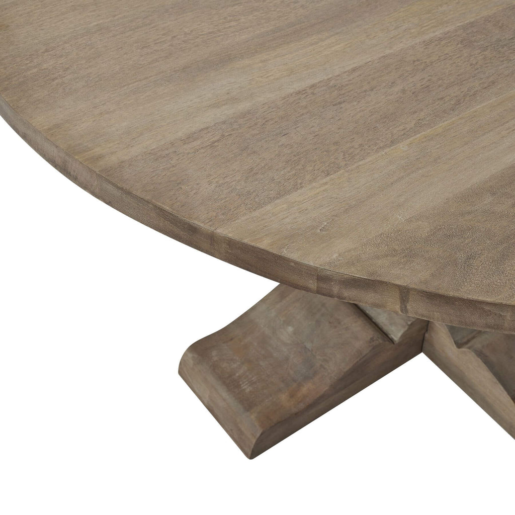 Round pedestal dining table with bleached hardwood top, black iron accents, and French-inspired design for elegant gatherings. by Sostter at brixbailey.com