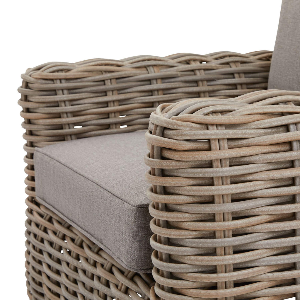 Premium beige outdoor wicker set with Olefin cushions and acacia wood coffee table by Sostter at brixbailey.com