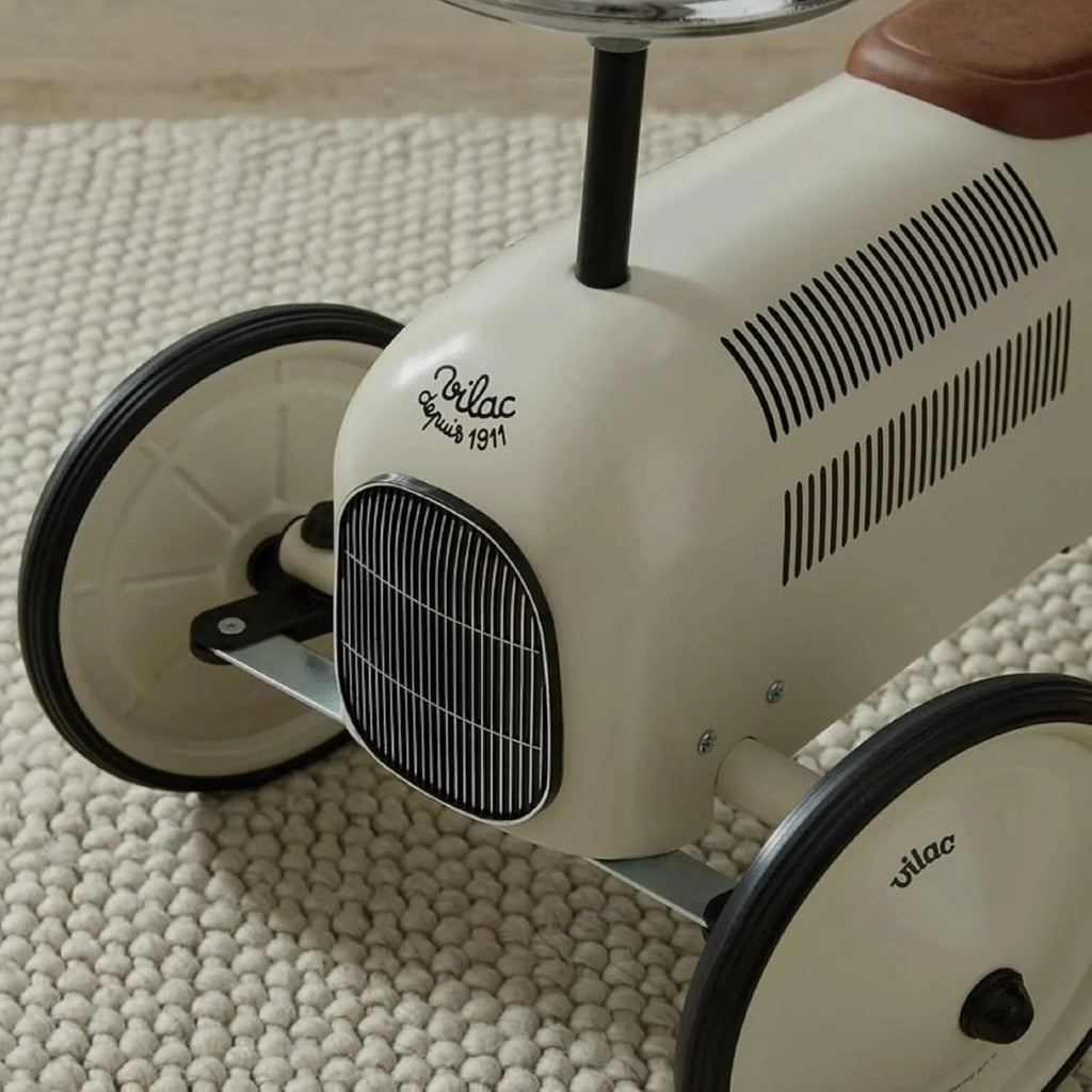 Off White Metal Ride On Car Toy