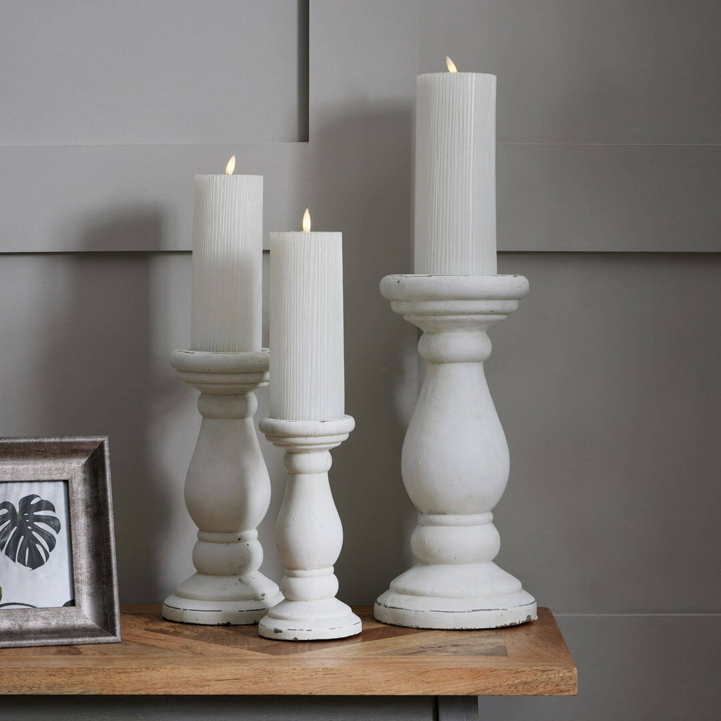 Minimalist white ceramic candle holder with clean lines and smooth matte finish for modern decor. by RoomLondon at brixbailey.com