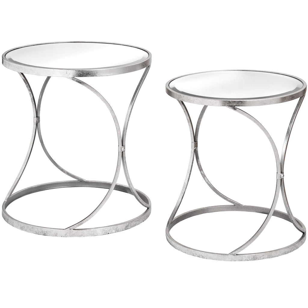 Silver mirrored curved side tables with metal frame, set of two for modern living room decor  

*(98 characters)*  
- **Keywords included:** silver, mirrored, curved side tables, metal frame, modern living room decor  
- **Clear description:** Describes shape, material, color, and quantity  
- **SEO & accessibility optimized:** Concise, avoids redundancy, focuses on visual details by RoomLondon at brixbailey.com