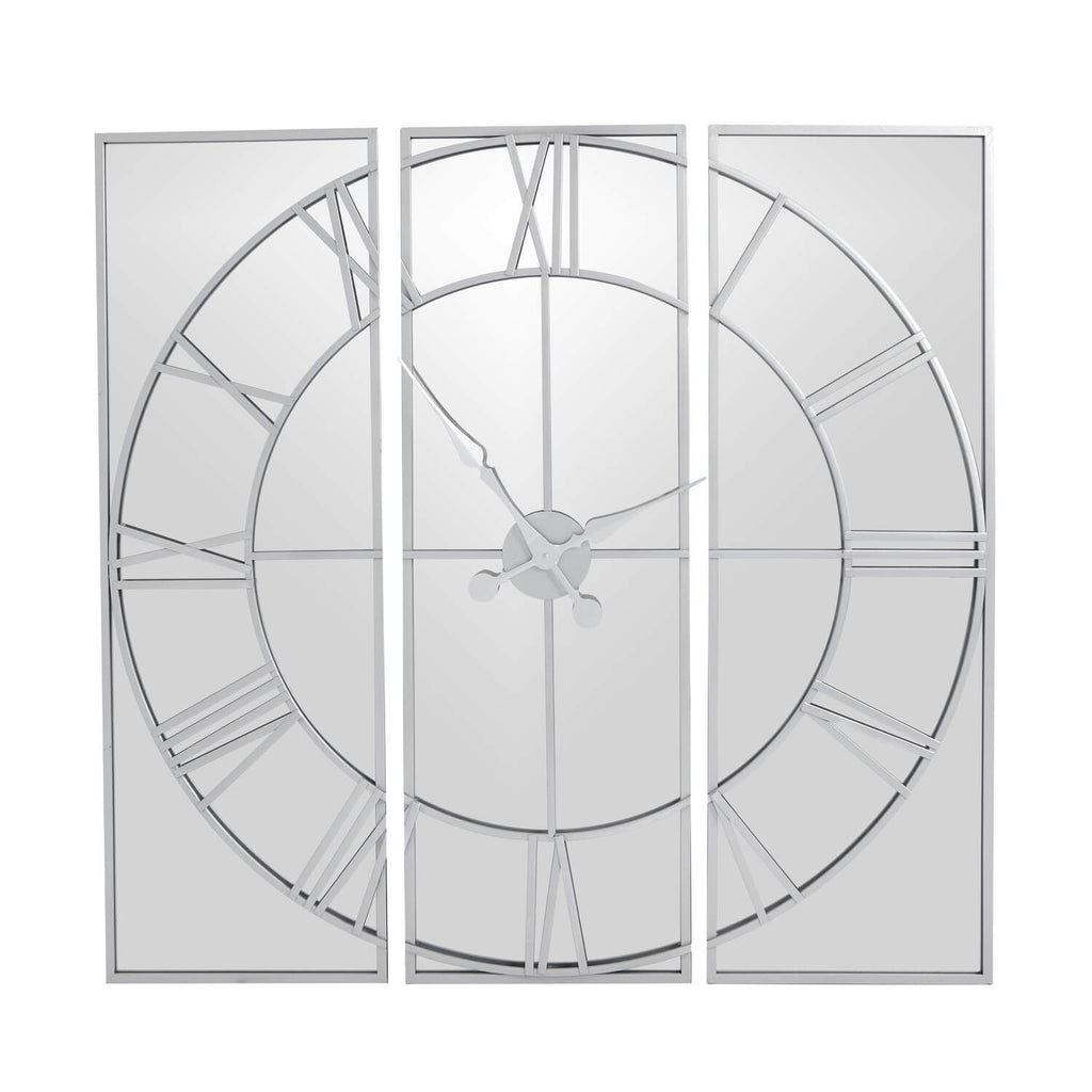 Celina mirrored wall clock with silver metal frame, modern skeleton design, and reflective glass surface by Sostter at brixbailey.com