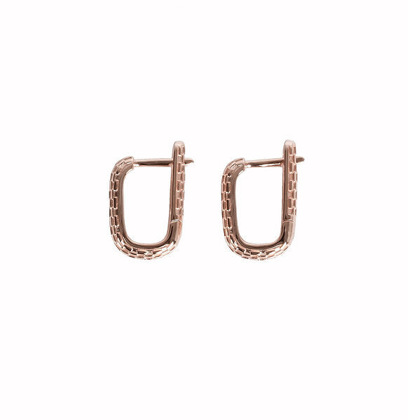 bold rose gold honey bee hoopy earrings in dramatic studio lighting