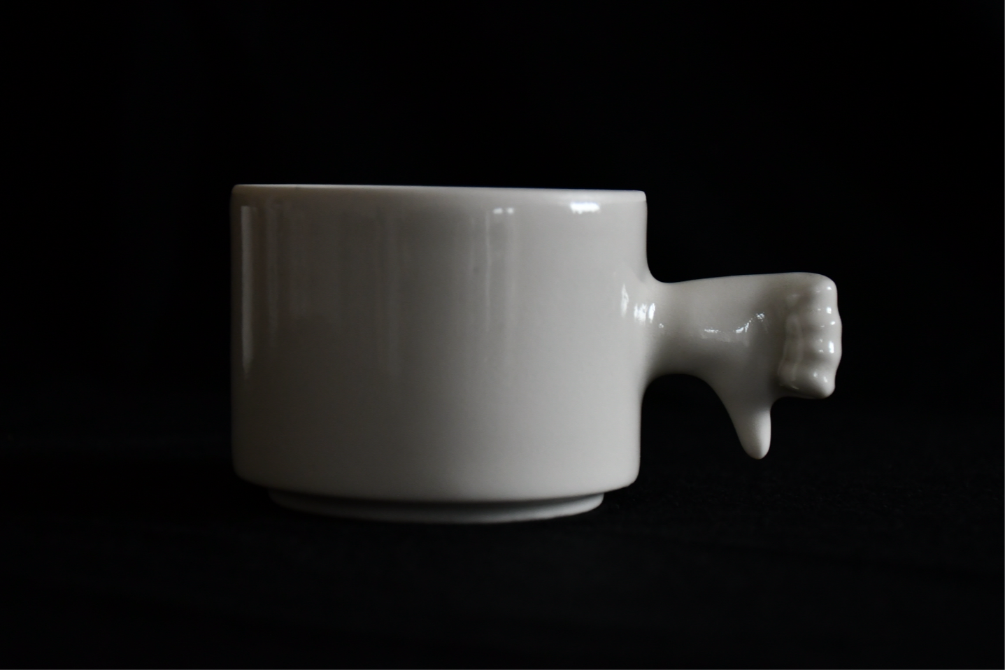 Thumb Down Gesture Cup in Porcelain