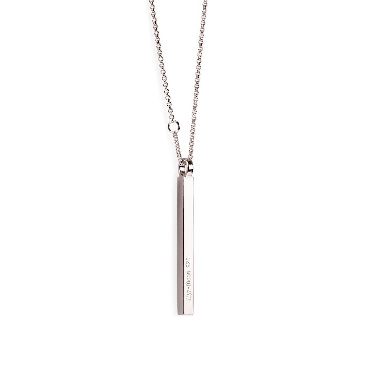 softly lit silverbar necklace resting on a delicate fabric, a comforting and elegant gift for her