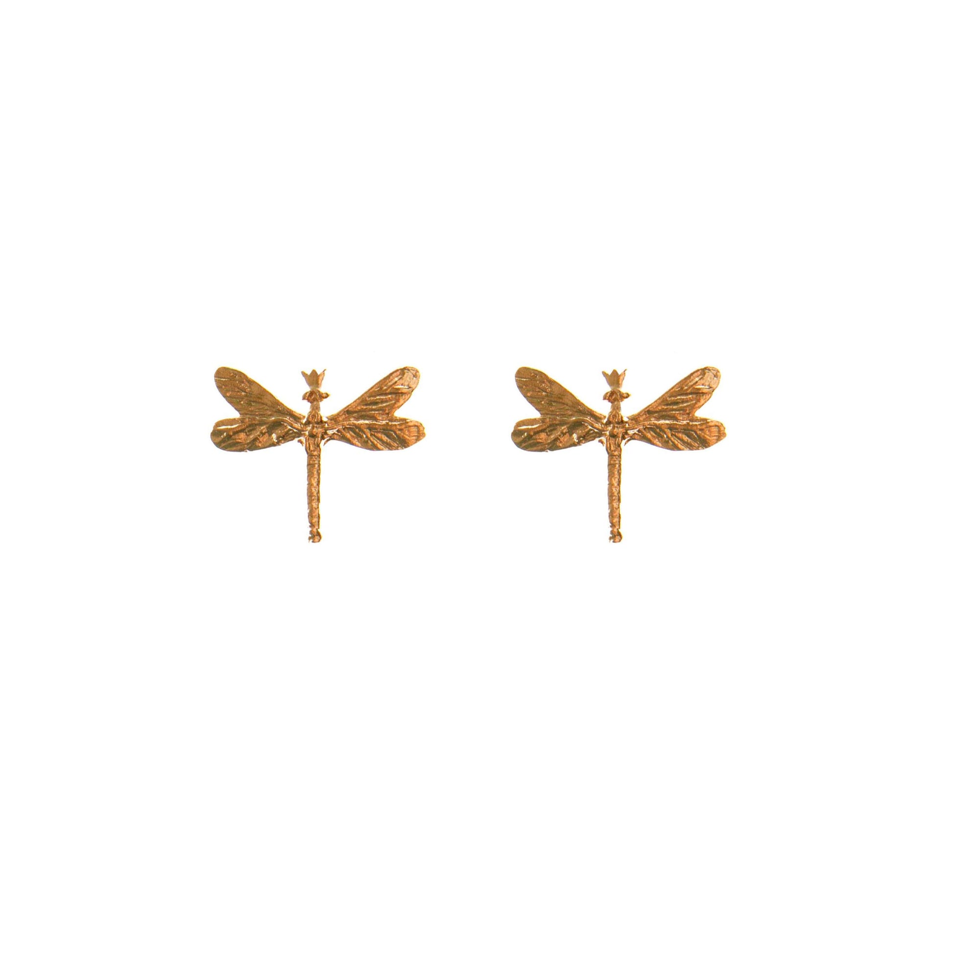 bold close-up of gold dragonfly earrings with a confident, radiant shine
