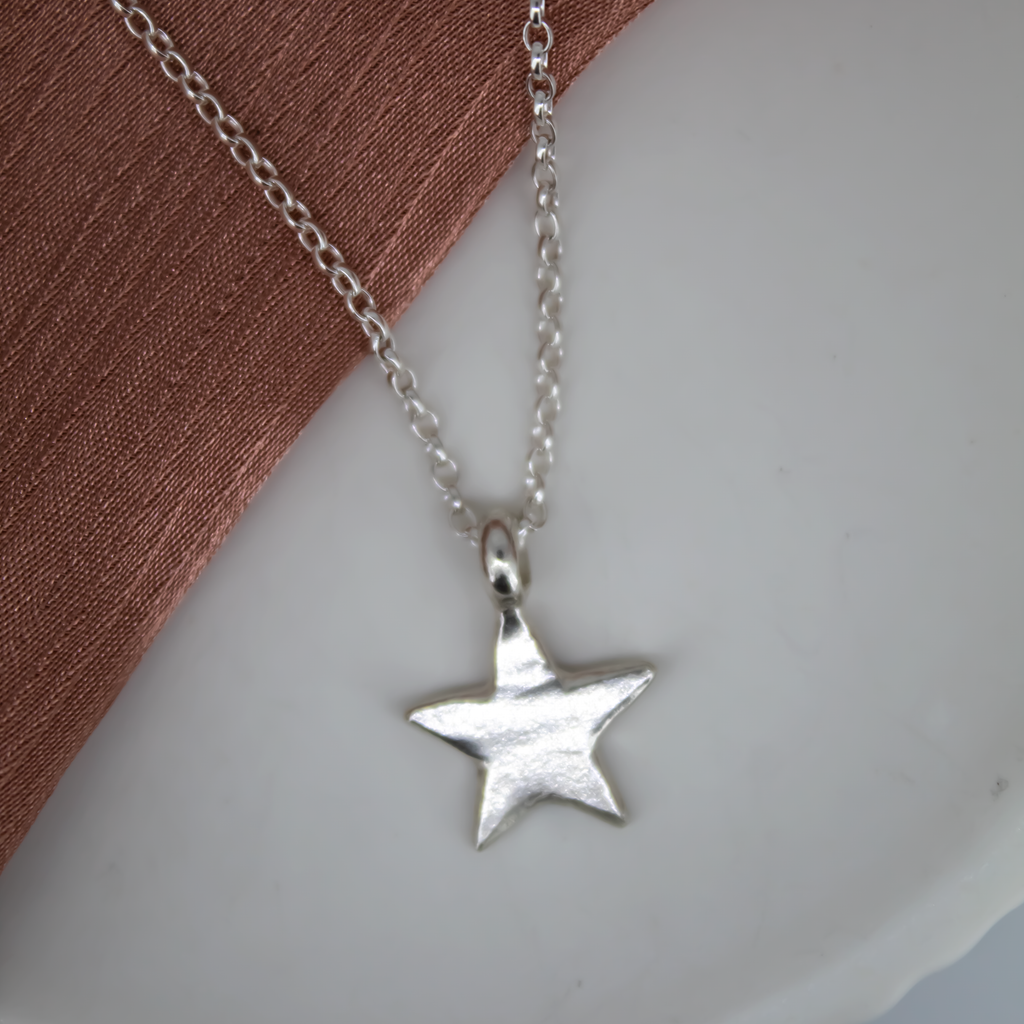 Lucky Charm Star Necklace in Sterling Silver