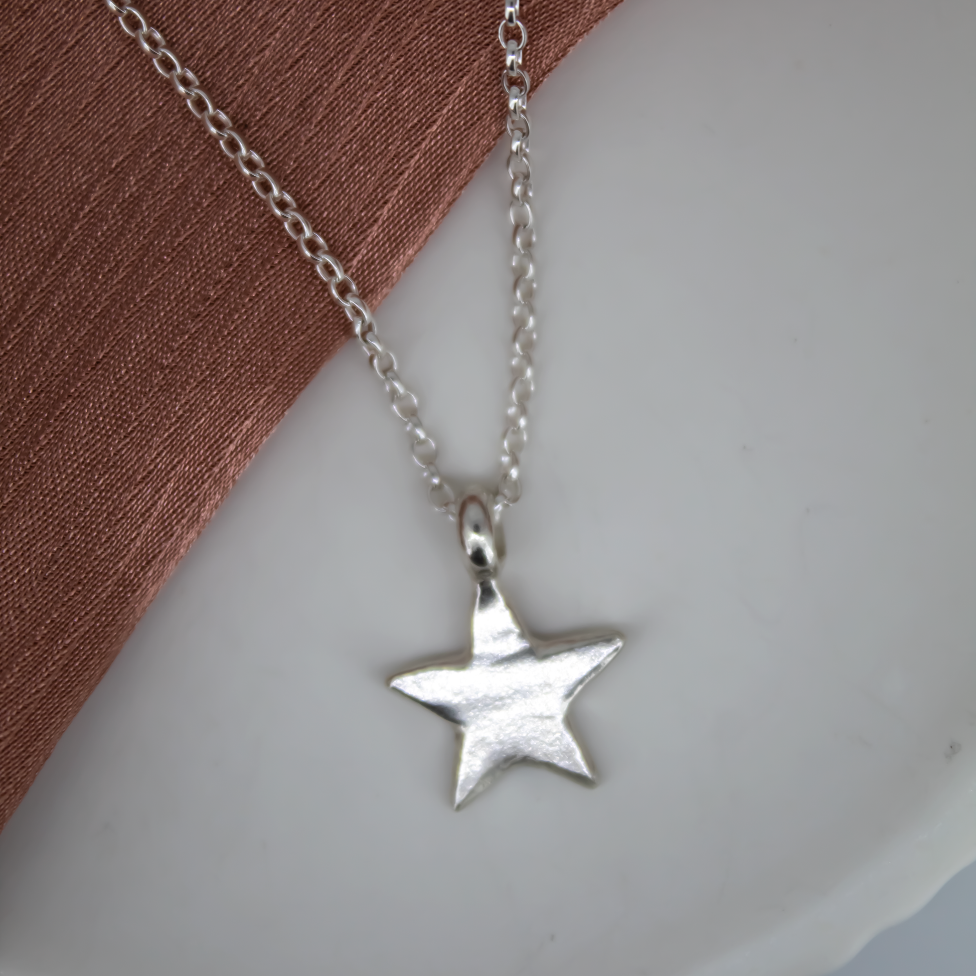 Lucky Charm Star Necklace in Sterling Silver