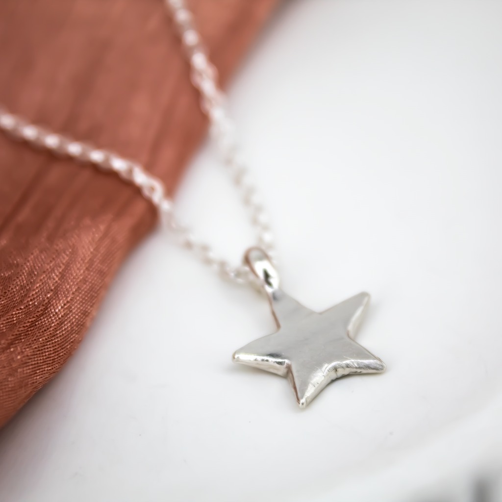 Lucky Charm Star Necklace in Sterling Silver
