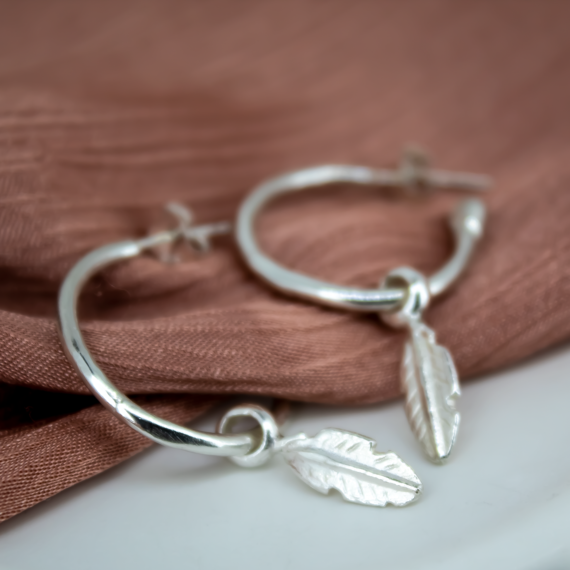 Baby Feather Hoops in Sterling Silver