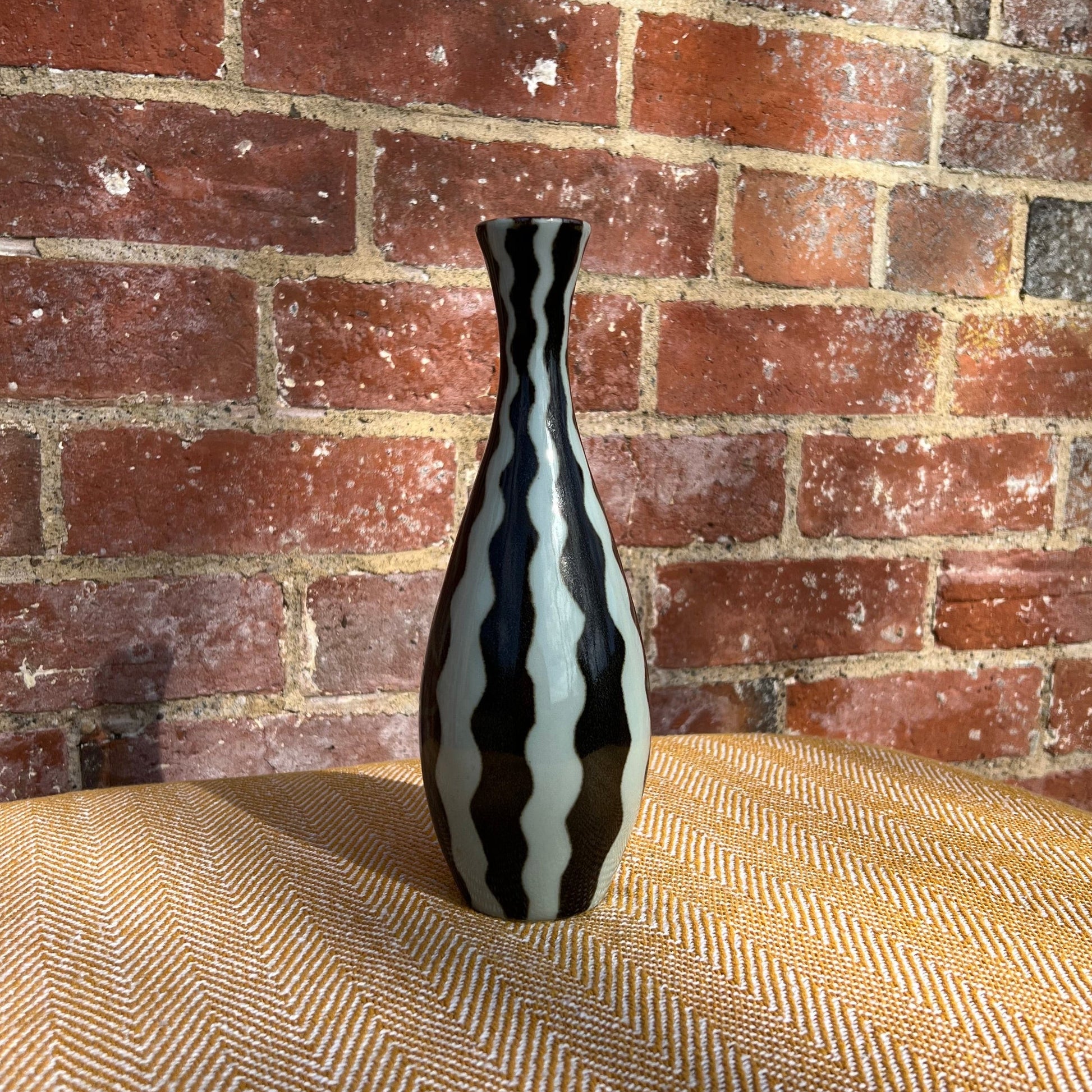 Black and white striped vase