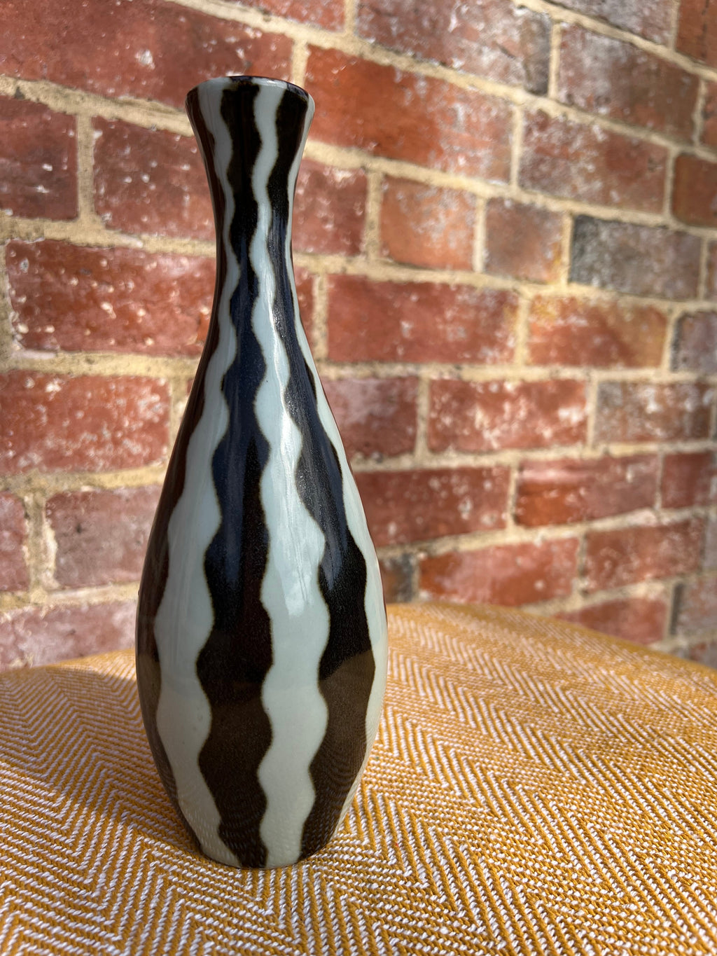Black and white striped vase