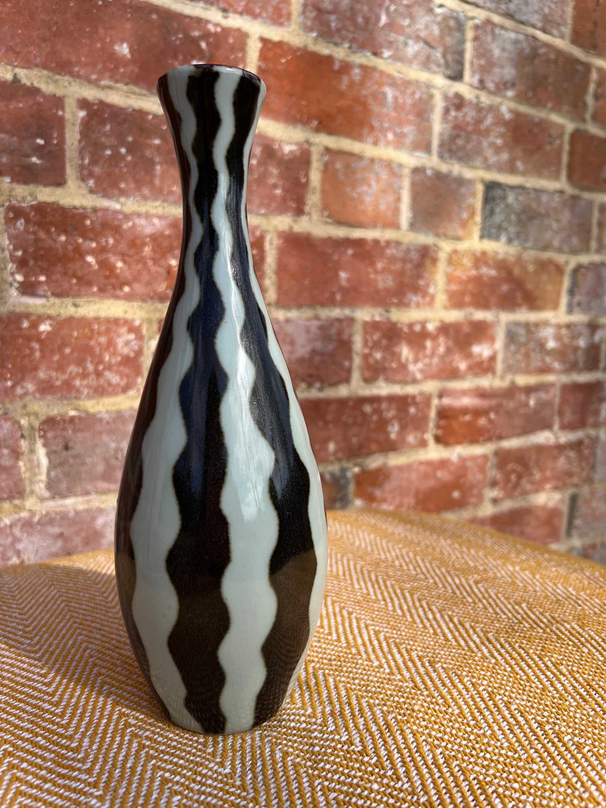 Black and white striped vase