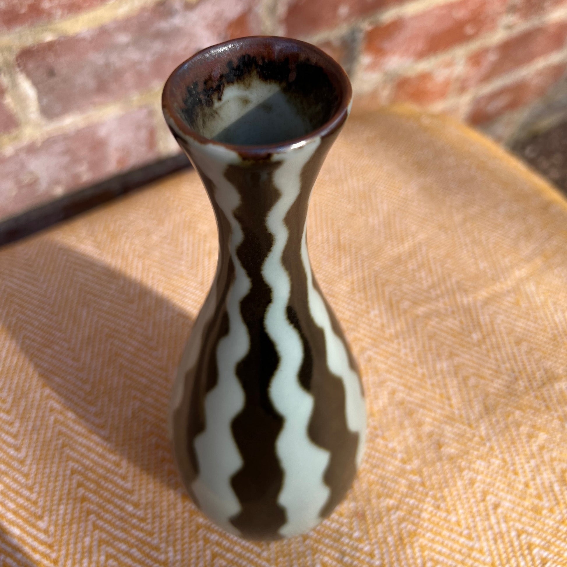 Black and white striped vase