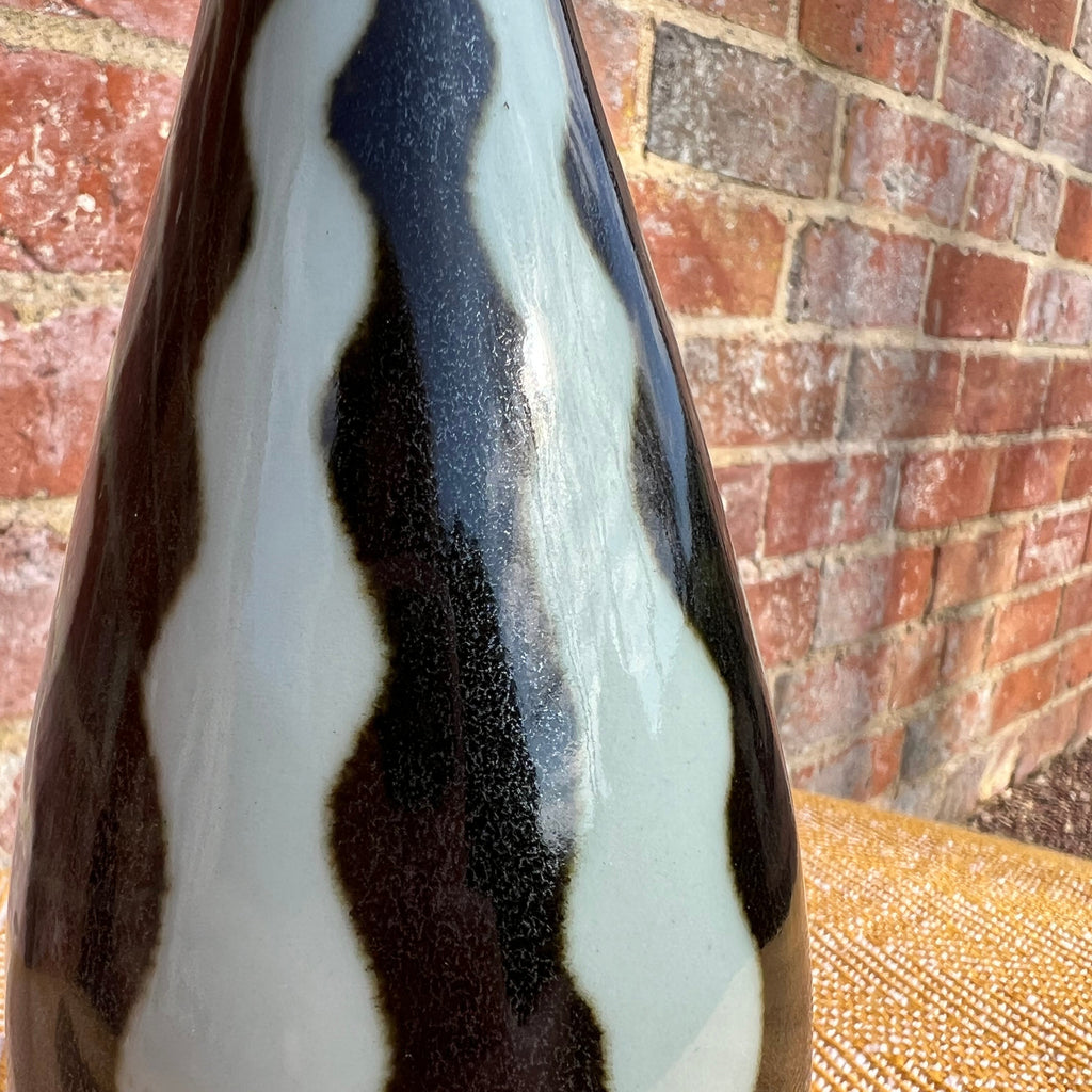 Black and white striped vase