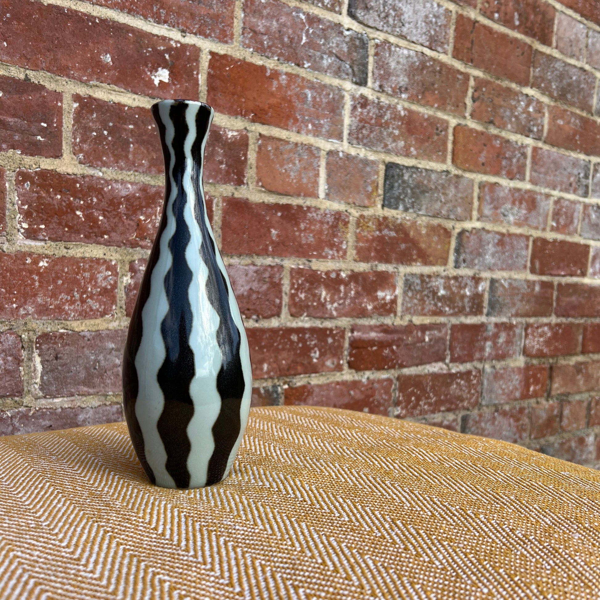 Black and white striped vase