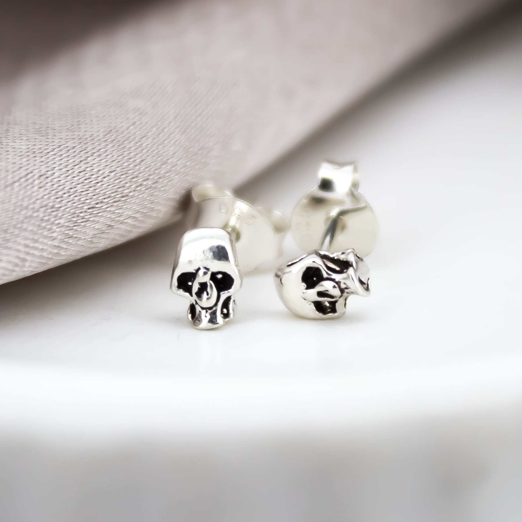 Mini Skull Studs in Sterling Silver