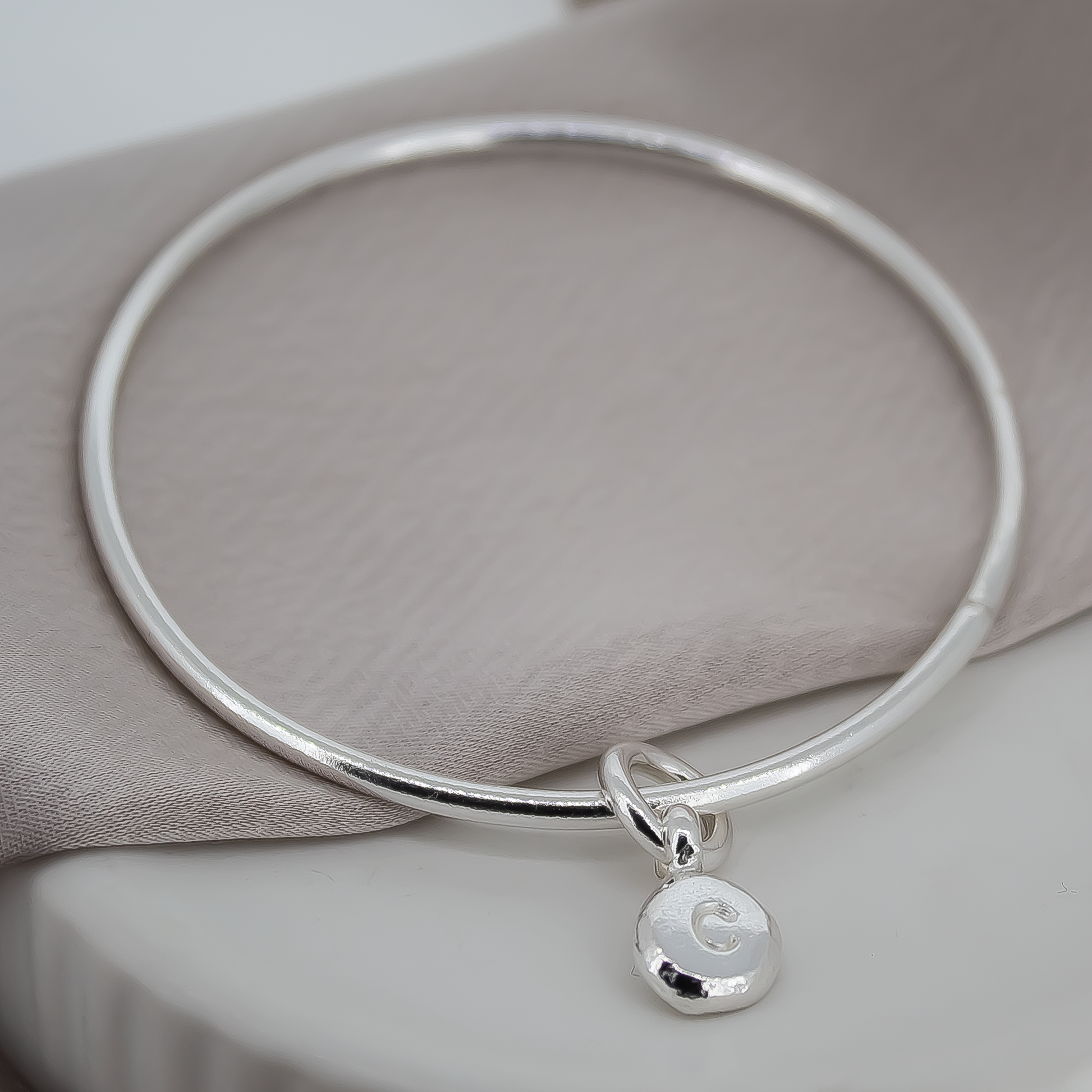 Pebble Charm Bangle in Sterling Silver
