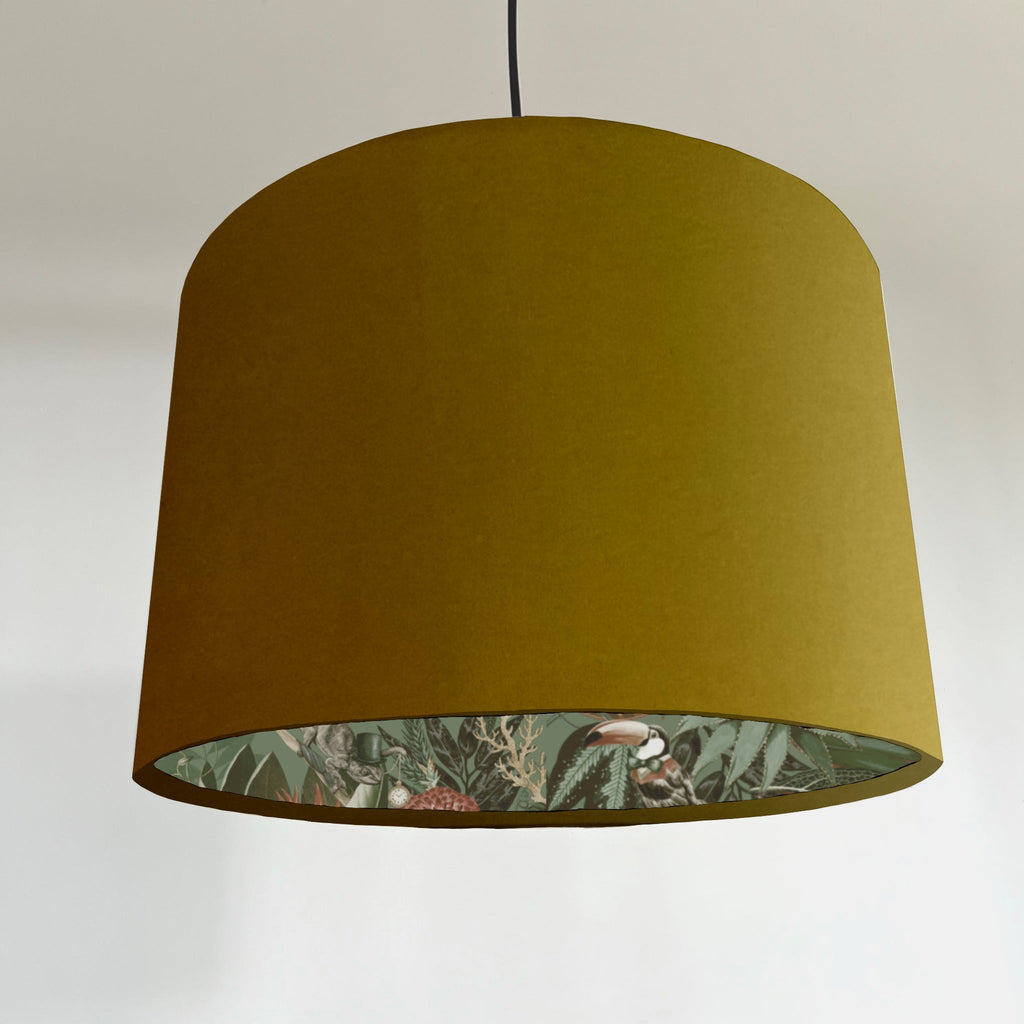 Mustard velvet wonderland drum lampshade, double sided lampshade with sage wonderland paper on interior