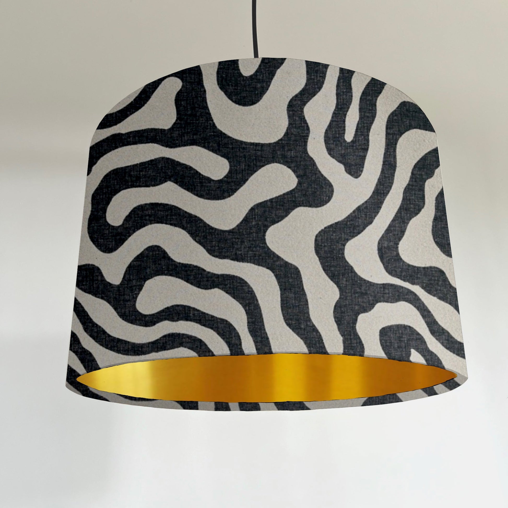 Black wiggle drum lampshade/ ceiling shade with a metallic brushed gold lining