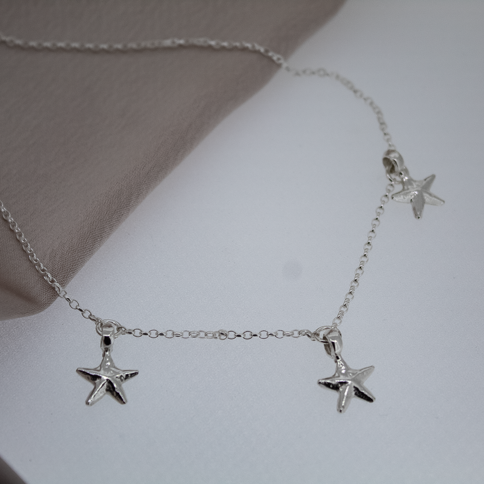 3 Starfish Charm Necklace in Sterling Silver