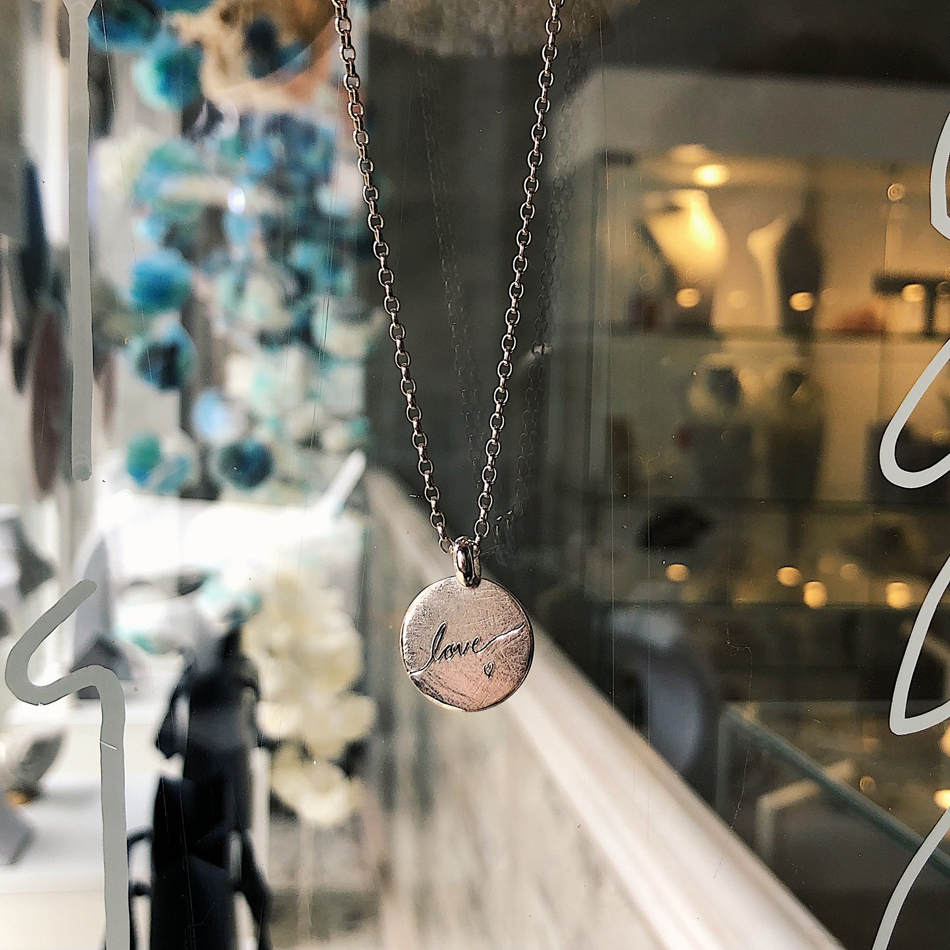 Love Disc Necklace in Sterling Silver